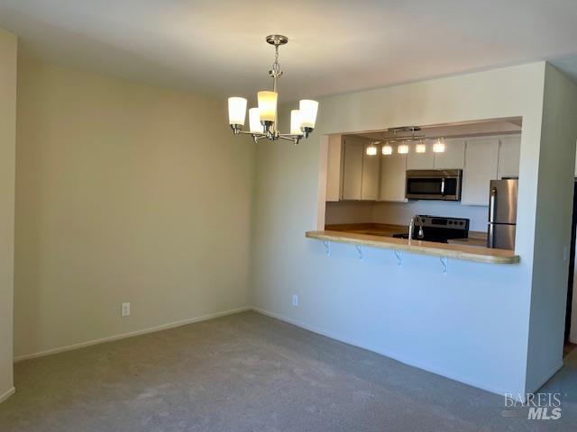 14 Scottsdale Way Novato, CA 94947 - Photo 11 of 34 a view of a kitchen with a sink a dishwasher and refrigerator
