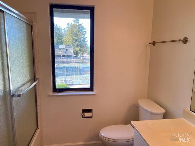 14 Scottsdale Way Novato, CA 94947 - Photo 16 of 34 a white toilet sitting next to a bathroom sink