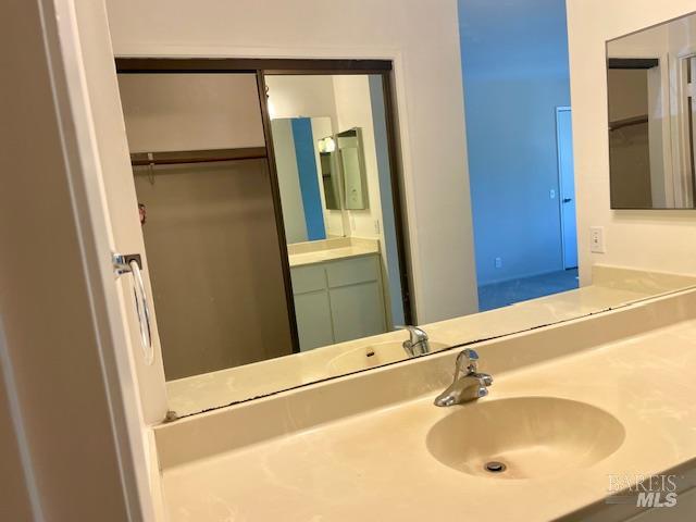 14 Scottsdale Way Novato, CA 94947 - Photo 24 of 34 a bathroom with a sink and mirror
