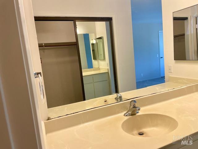 14 Scottsdale Way Novato, CA 94947 - Photo 25 of 34 a bathroom with a sink and mirror