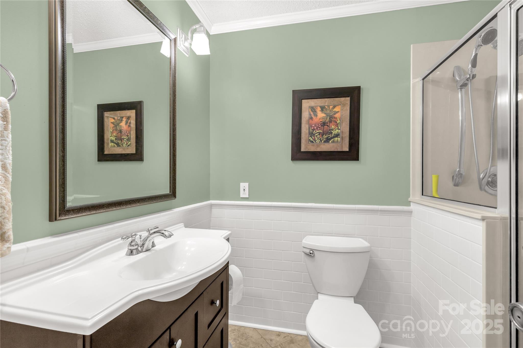 1162 East Doc Garris Road Lancaster, SC 29720 - Photo 18 of 31 a bathroom with a toilet sink and mirror