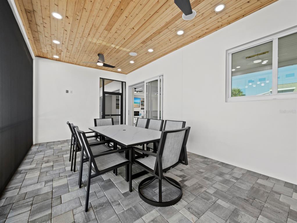 635 Jungle Queen Way Longboat Key, FL 34228 - Photo 21 of 55 a view of a dining room with furniture