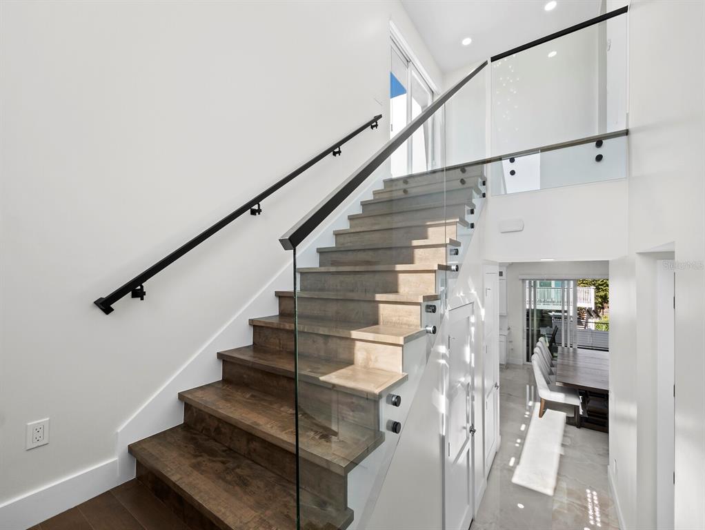 635 Jungle Queen Way Longboat Key, FL 34228 - Photo 29 of 55 a view of entryway and hall with wooden floor
