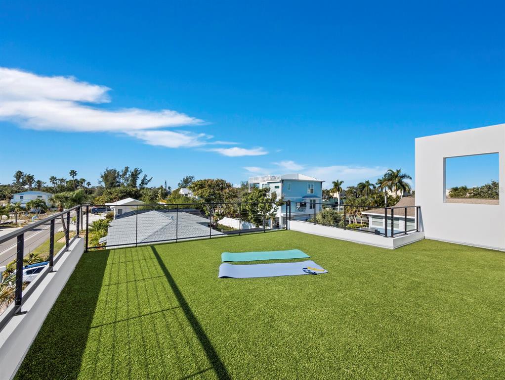 635 Jungle Queen Way Longboat Key, FL 34228 - Photo 32 of 55 a view of swimming pool with a yard
