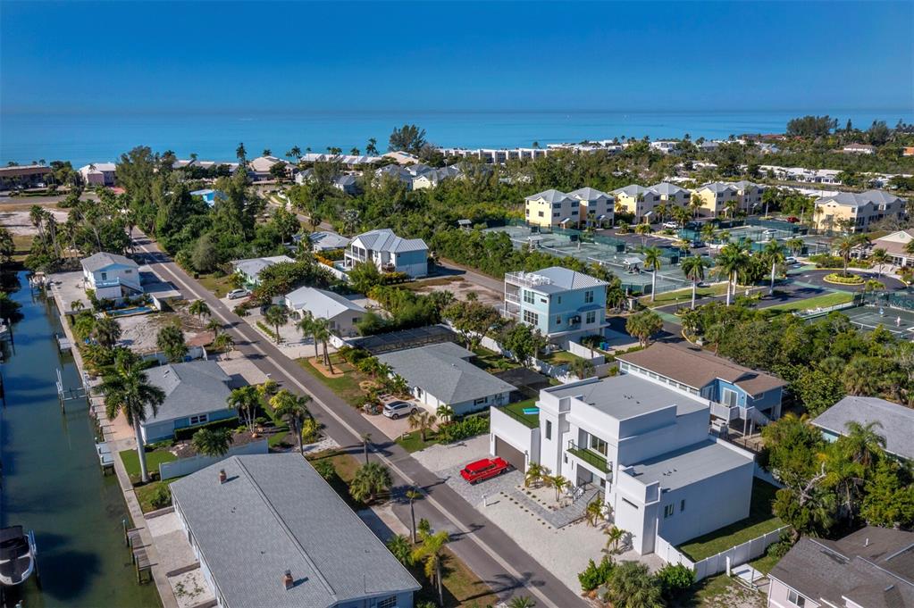 635 Jungle Queen Way Longboat Key, FL 34228 - Photo 50 of 55 an aerial view of residential houses with city view