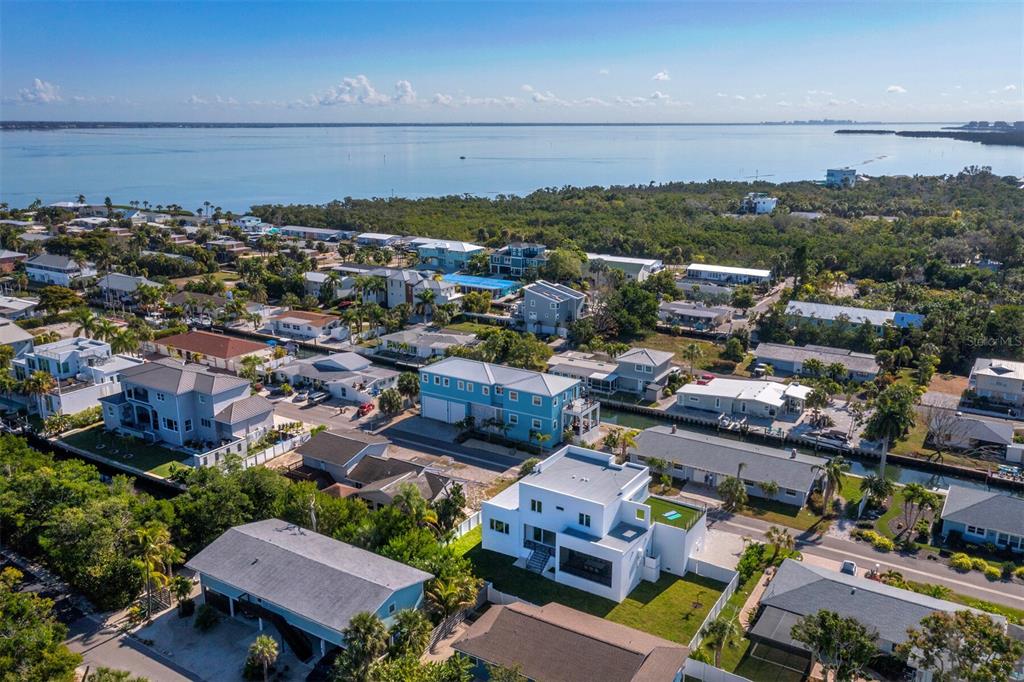 635 Jungle Queen Way Longboat Key, FL 34228 - Photo 51 of 55 an aerial view of a houses with a city view