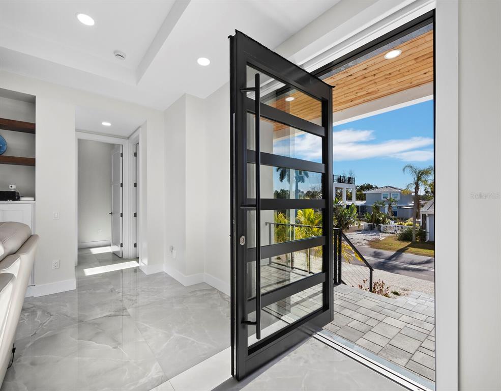 635 Jungle Queen Way Longboat Key, FL 34228 - Photo 8 of 55 a view of a hallway with interior of the house