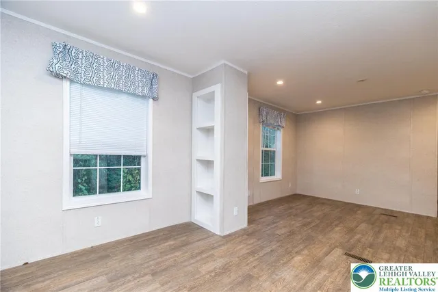 an empty room with windows