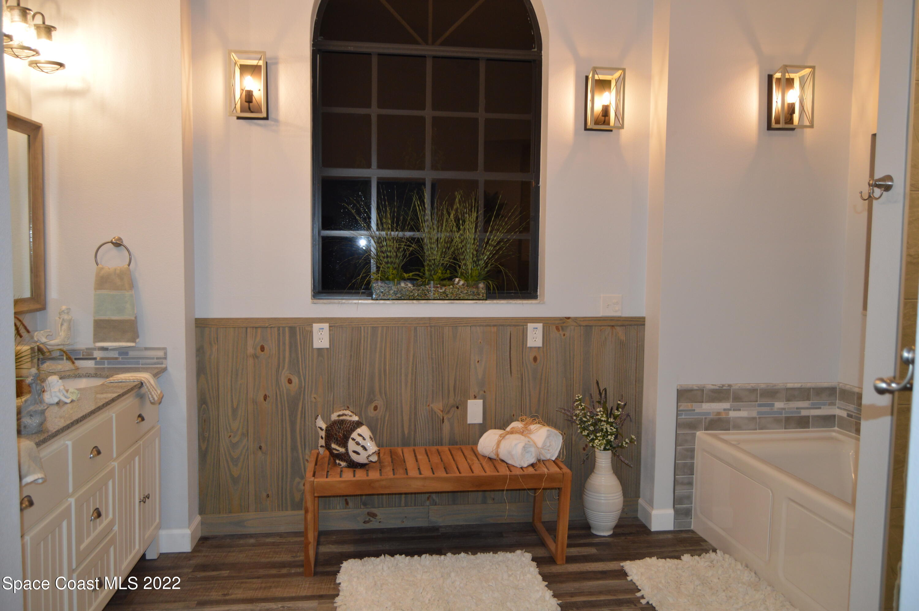 3460 Carter Road Mims, FL 32754 - Photo 11 of 32 a bathroom with a sink a toilet and shower