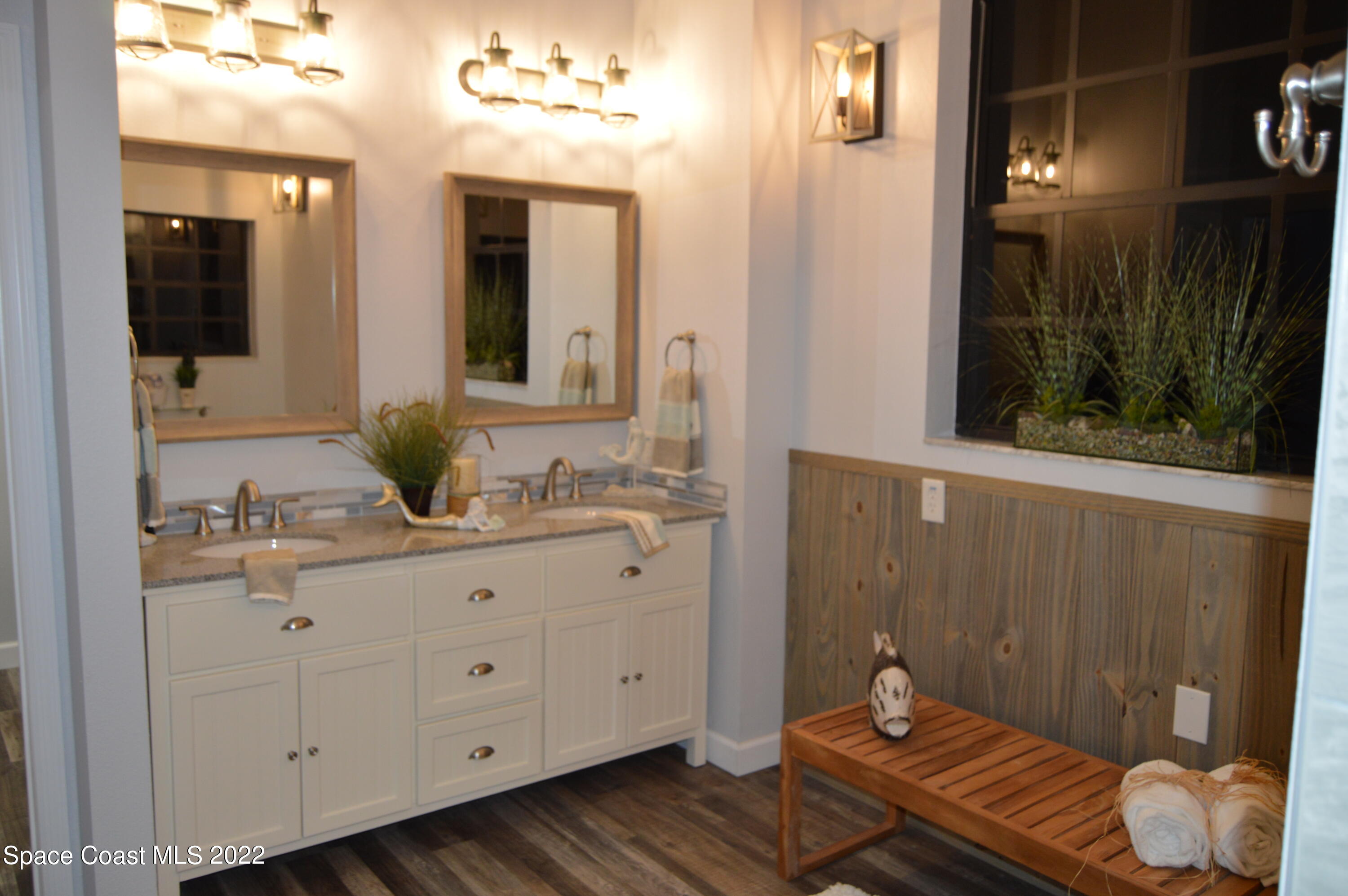 3460 Carter Road Mims, FL 32754 - Photo 12 of 32 a bathroom with a sink and a mirror
