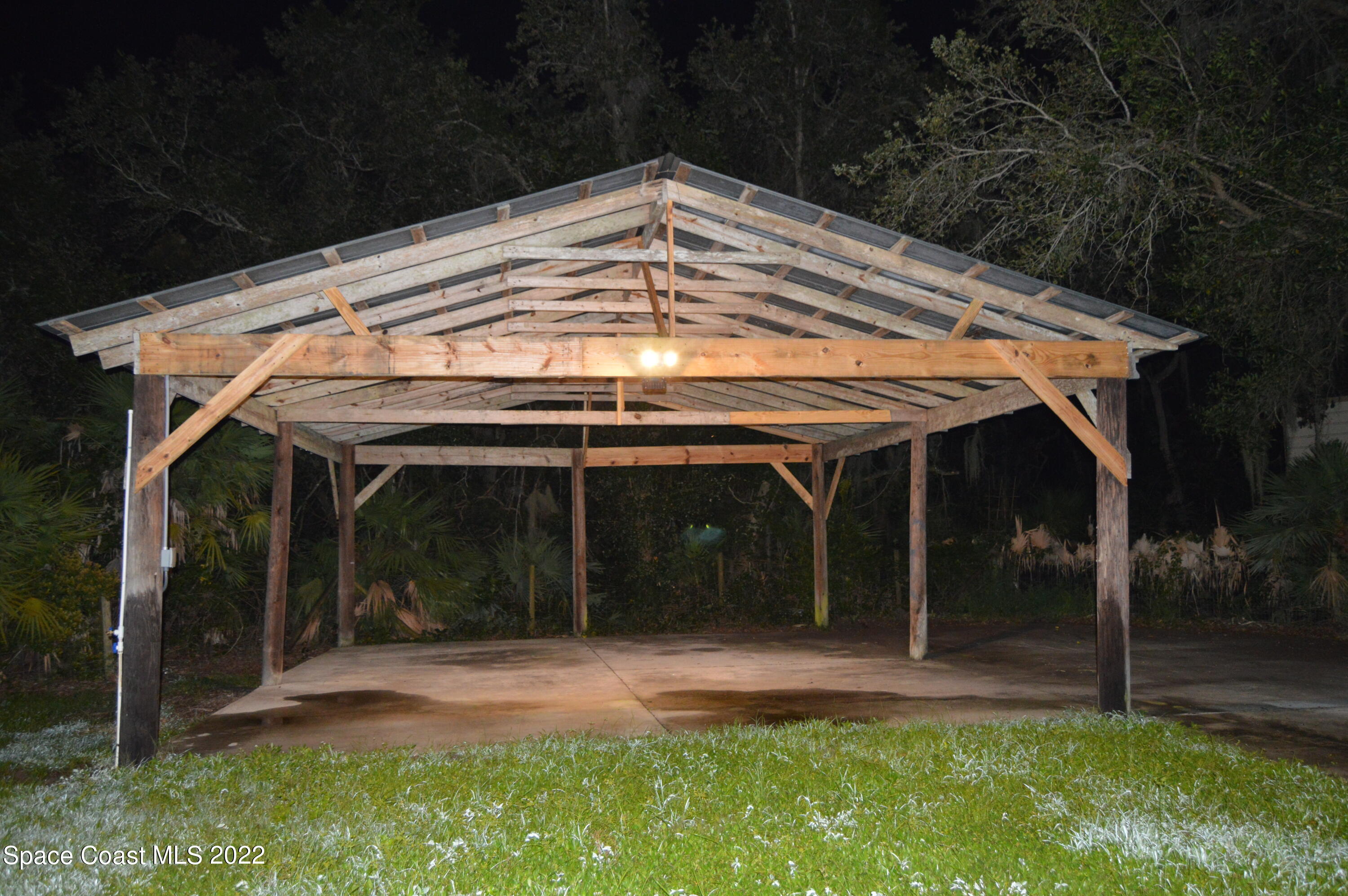 3460 Carter Road Mims, FL 32754 - Photo 19 of 32 a view of a backyard of the house