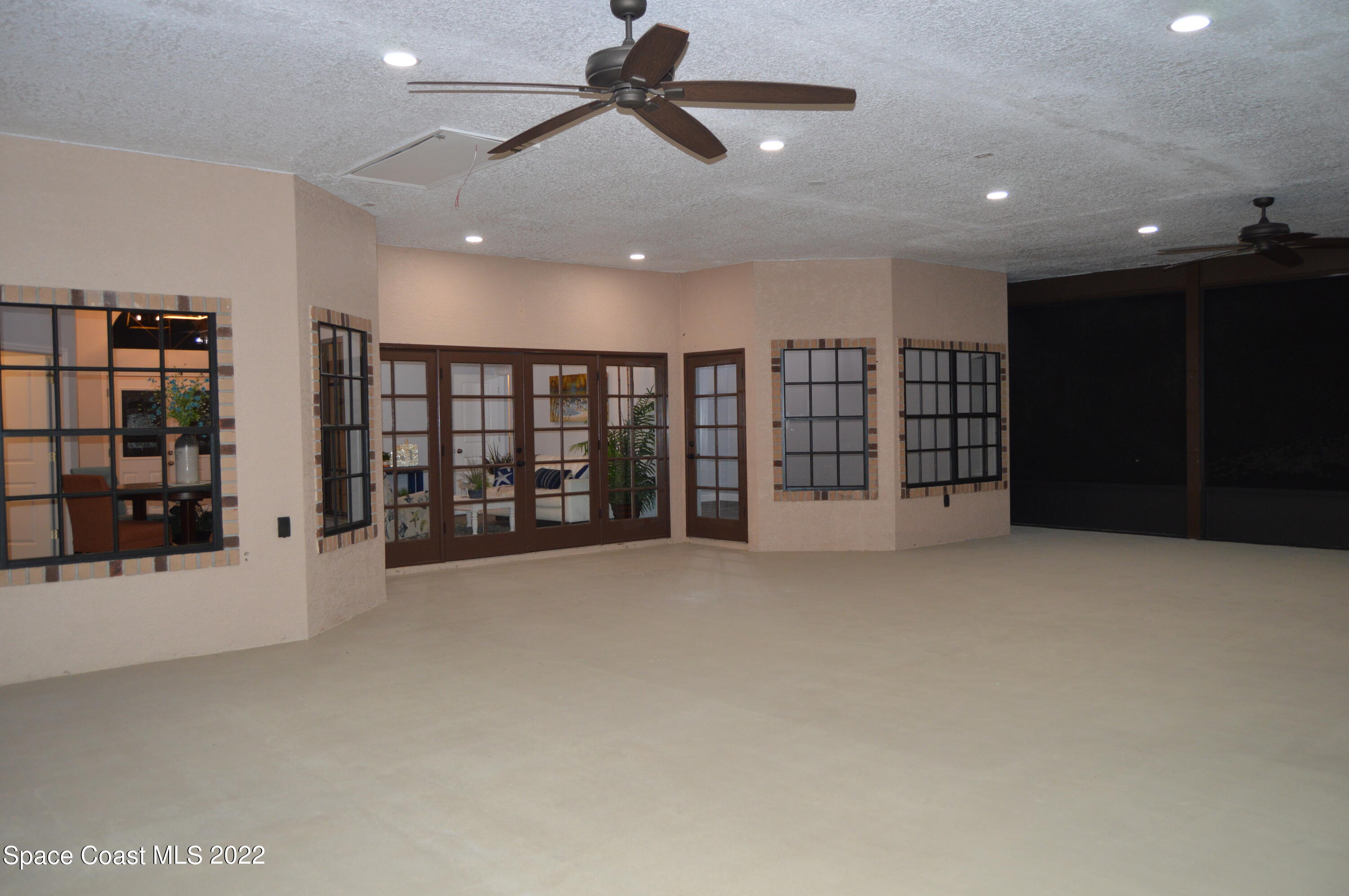 3460 Carter Road Mims, FL 32754 - Photo 22 of 32 a view of an empty room with bookshelf