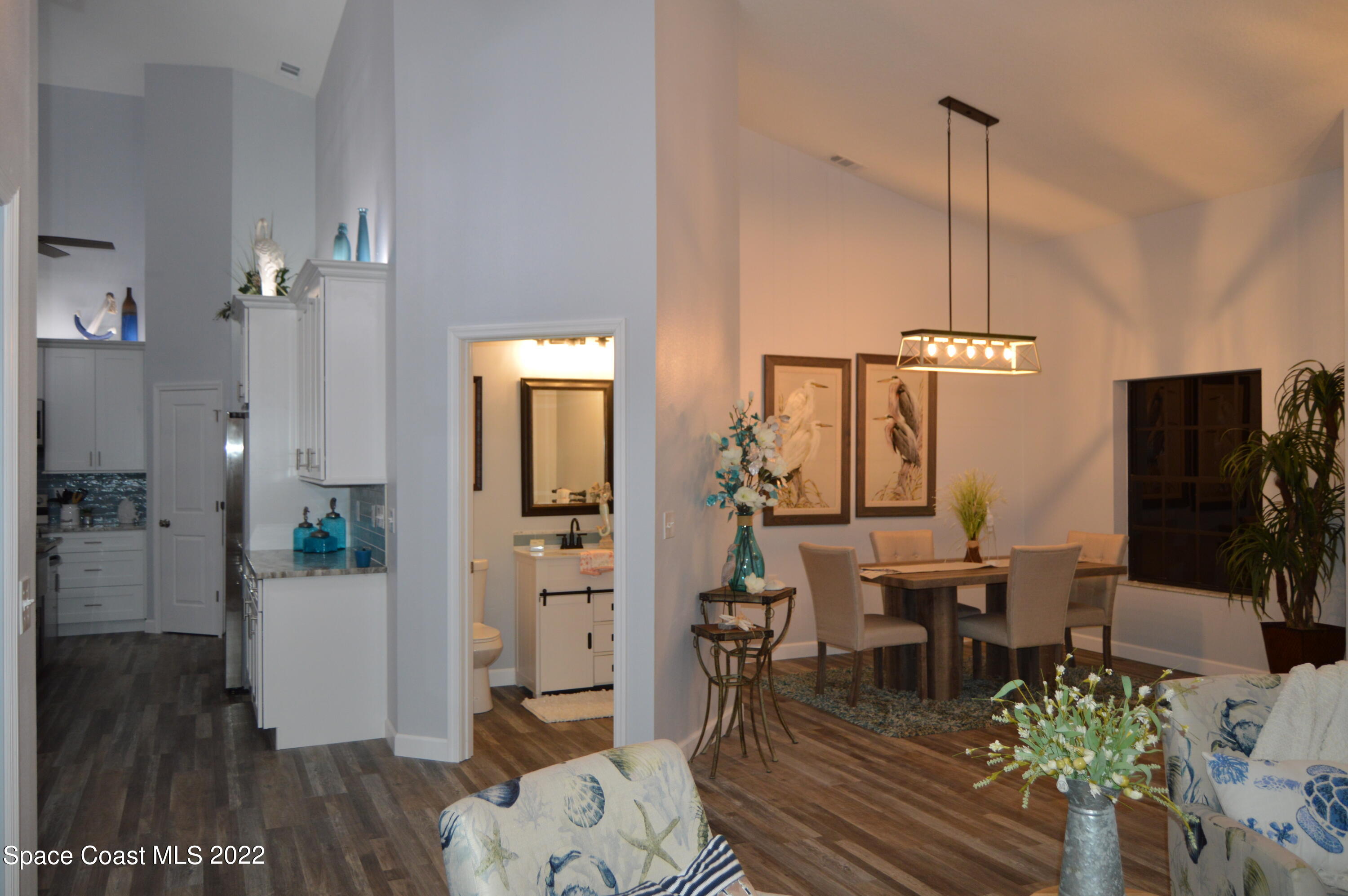3460 Carter Road Mims, FL 32754 - Photo 25 of 32 a view of a livingroom with furniture and wooden floor