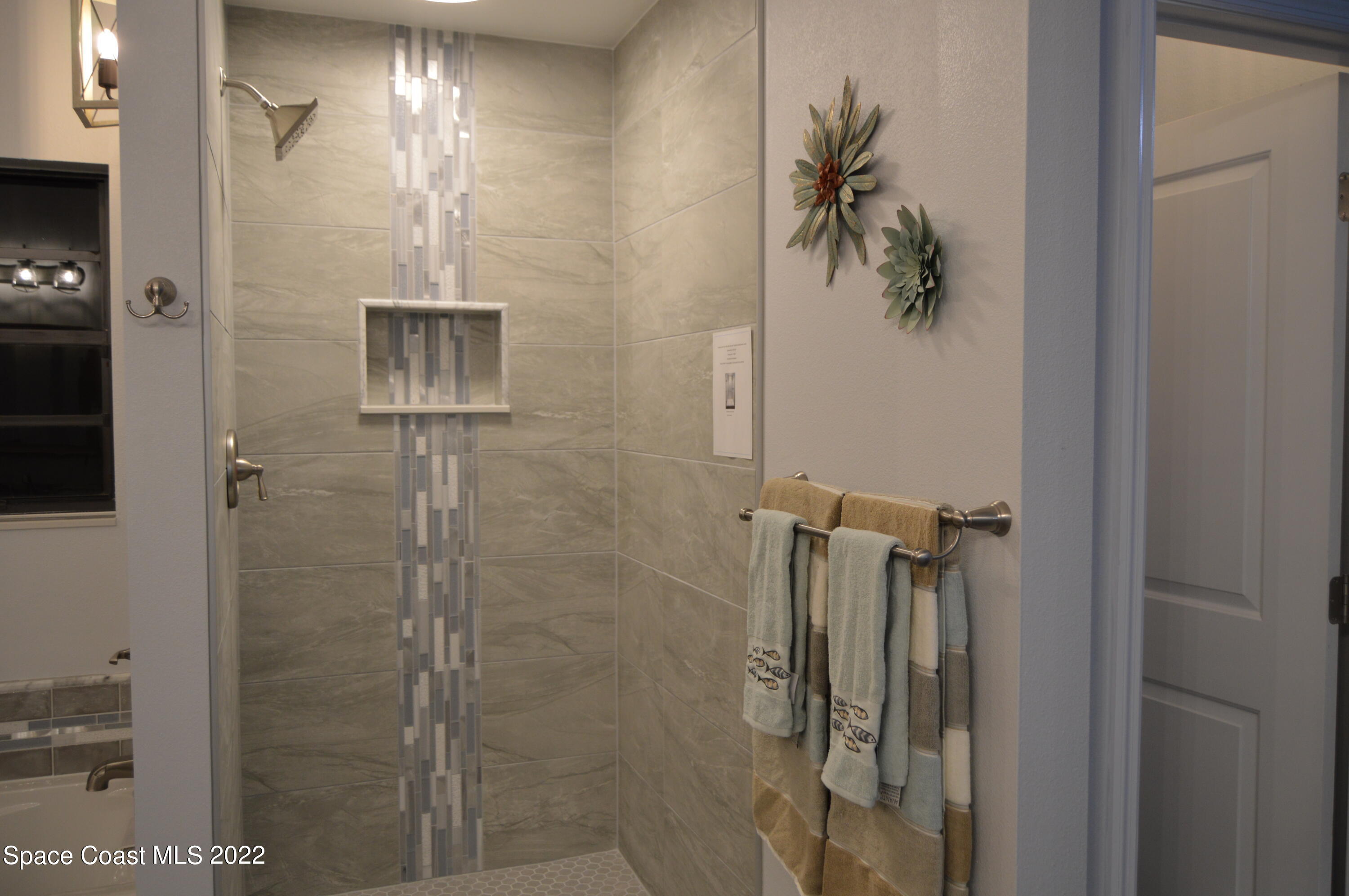3460 Carter Road Mims, FL 32754 - Photo 29 of 32 a bathroom with a shower