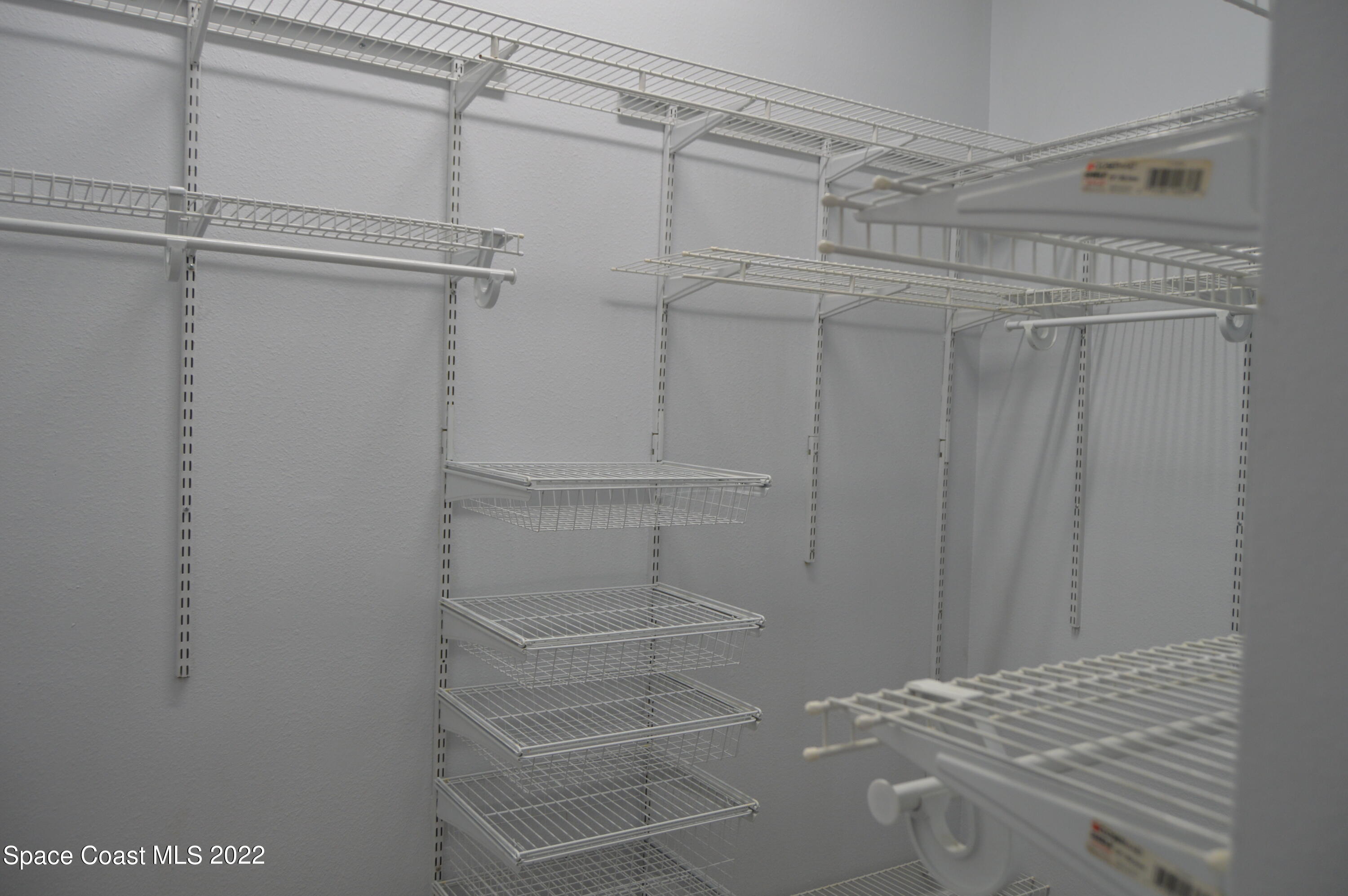 3460 Carter Road Mims, FL 32754 - Photo 31 of 32 a view of a room with racks on the wall