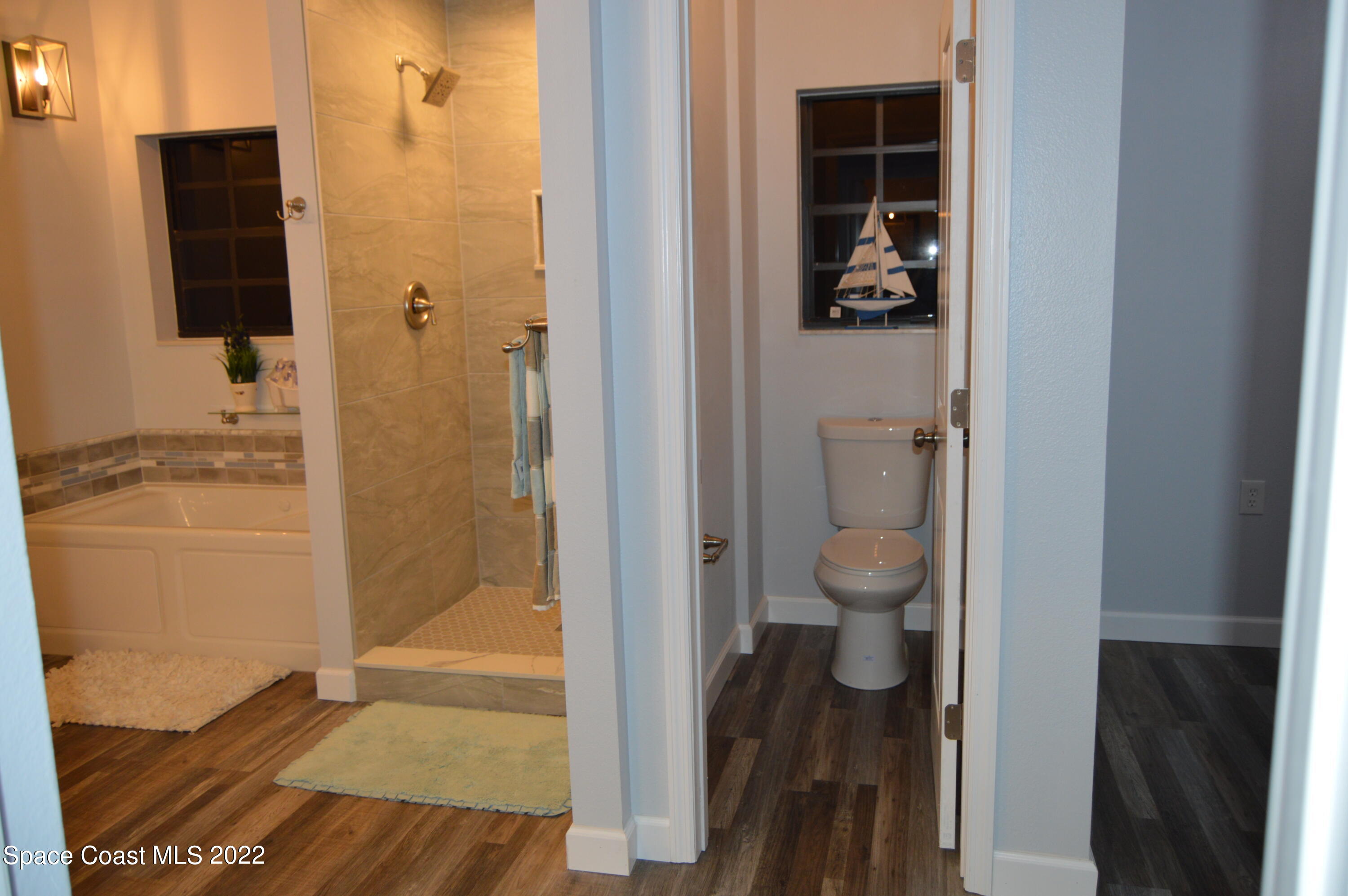 3460 Carter Road Mims, FL 32754 - Photo 32 of 32 a bathroom with a granite countertop shower