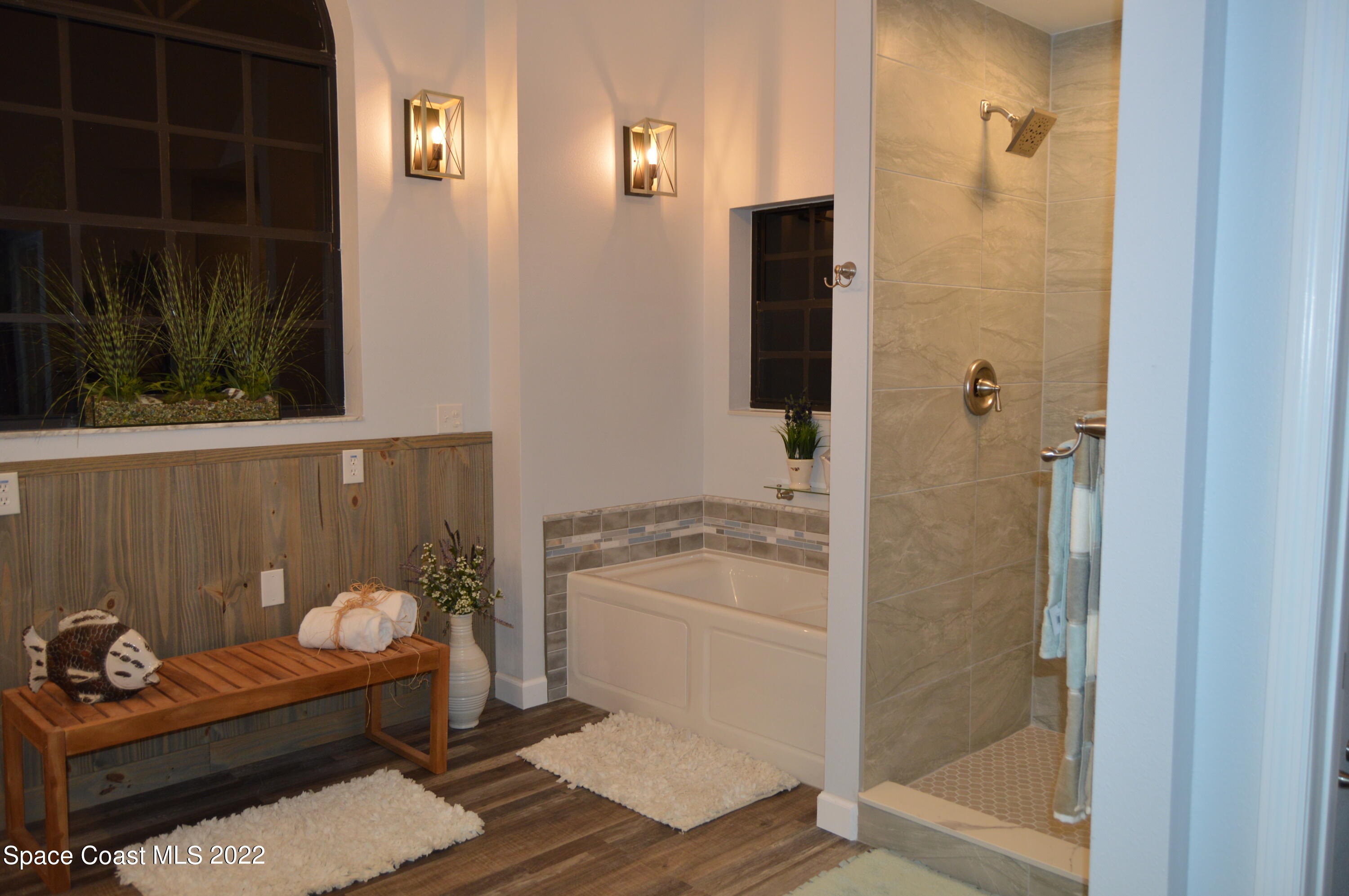 3460 Carter Road Mims, FL 32754 - Photo 10 of 32 a bathroom with a sink and a mirror