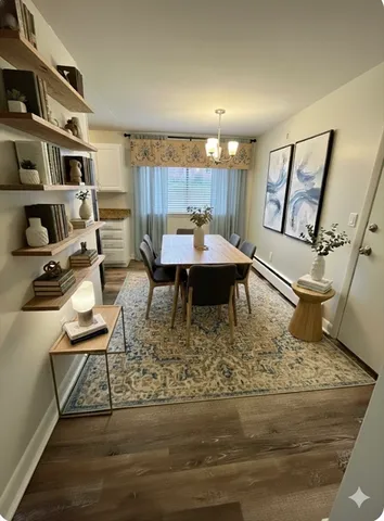 a kitchen with a granite countertop sink stove and cabinets