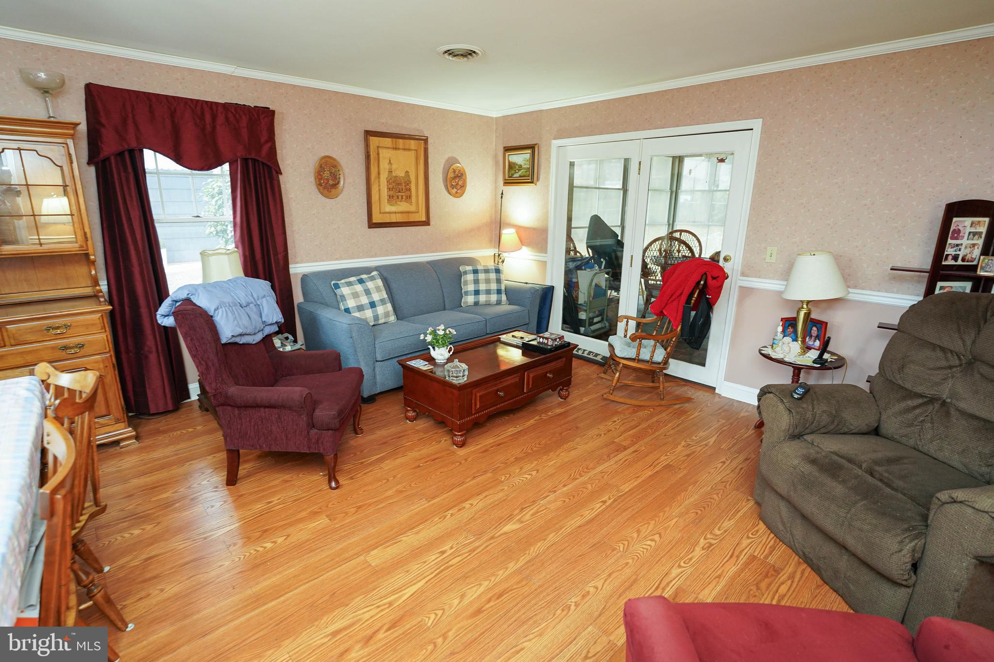 30332 Dagsboro Road Salisbury, MD 21804 - Photo 11 of 53 a living room with furniture and a flat screen tv