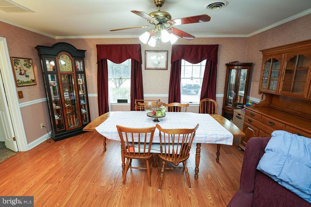 30332 Dagsboro Road Salisbury, MD 21804 - Photo 14 of 53 a view of a a dining room with furniture window and wooden floor