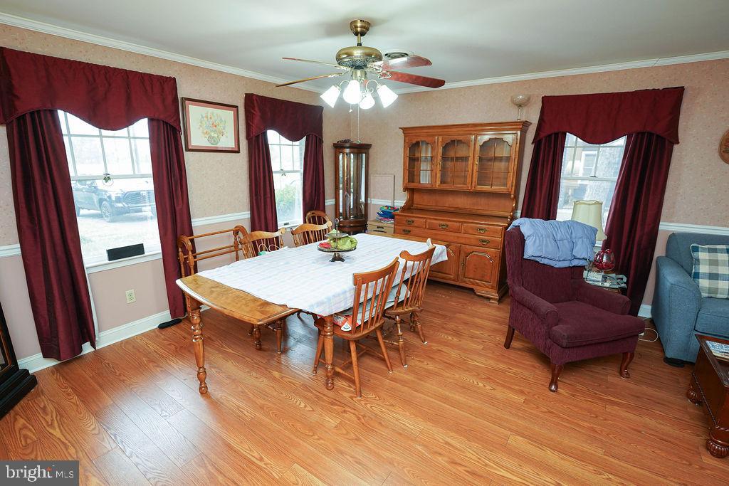 30332 Dagsboro Road Salisbury, MD 21804 - Photo 16 of 53 a view of a dining room with furniture window and wooden floor
