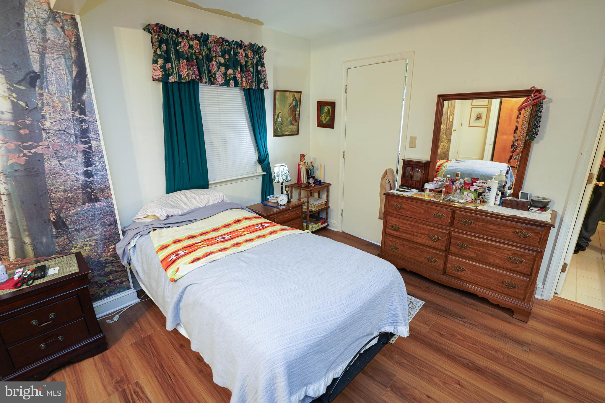 30332 Dagsboro Road Salisbury, MD 21804 - Photo 24 of 53 a bedroom with a bed and a dresser