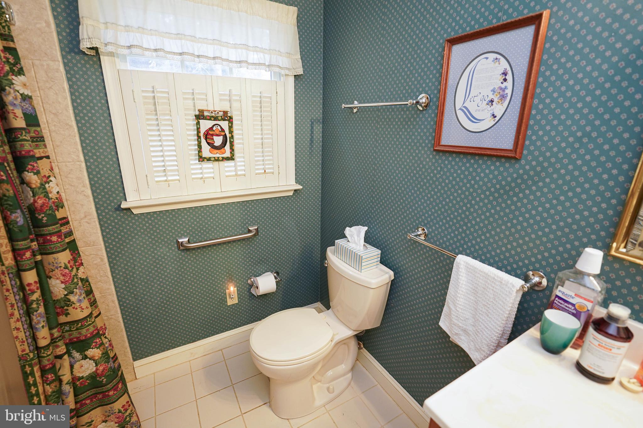 30332 Dagsboro Road Salisbury, MD 21804 - Photo 31 of 53 a bathroom with a toilet and a sink
