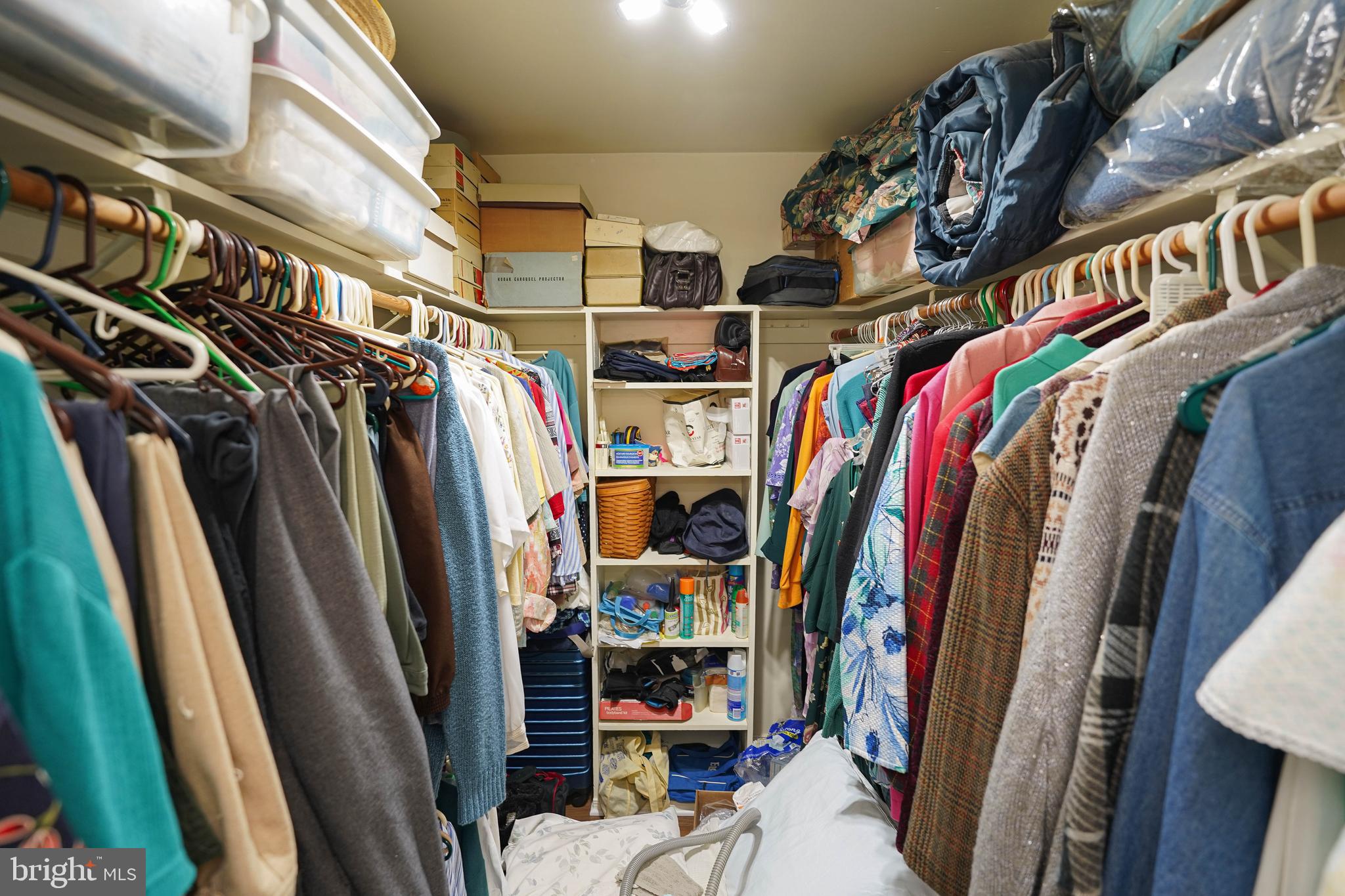 30332 Dagsboro Road Salisbury, MD 21804 - Photo 32 of 53 a view of walk in closet with clothes and shoes
