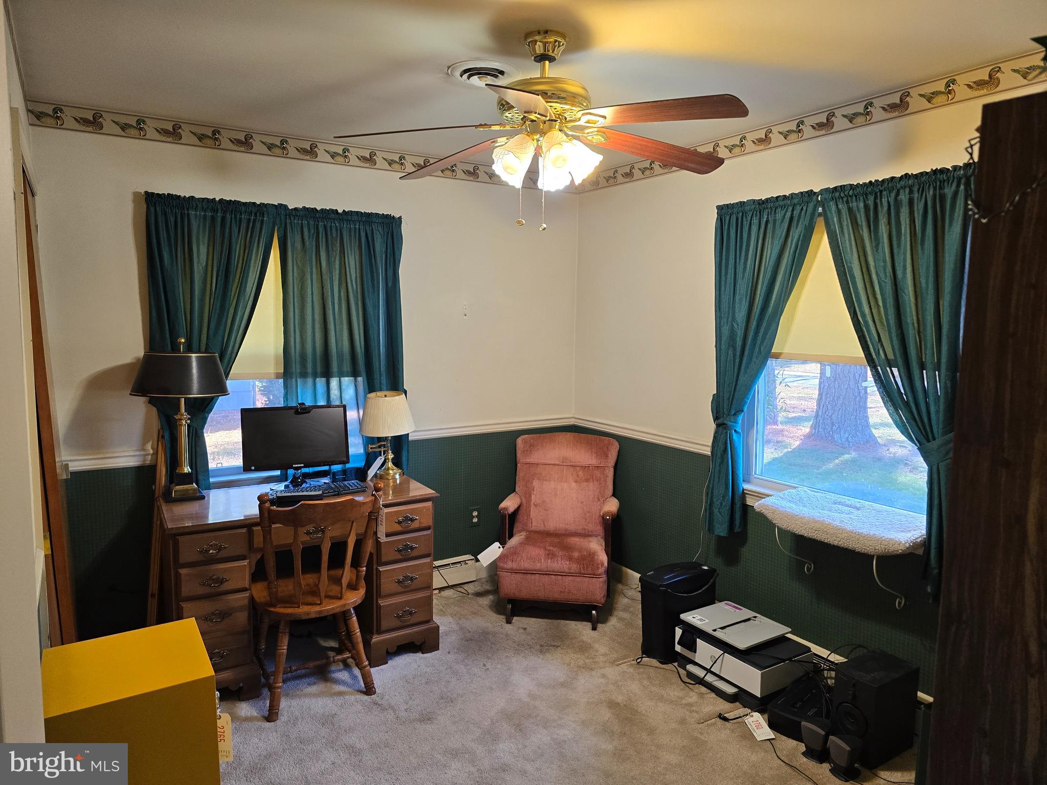 30332 Dagsboro Road Salisbury, MD 21804 - Photo 39 of 53 a living room with furniture a window and a chandelier