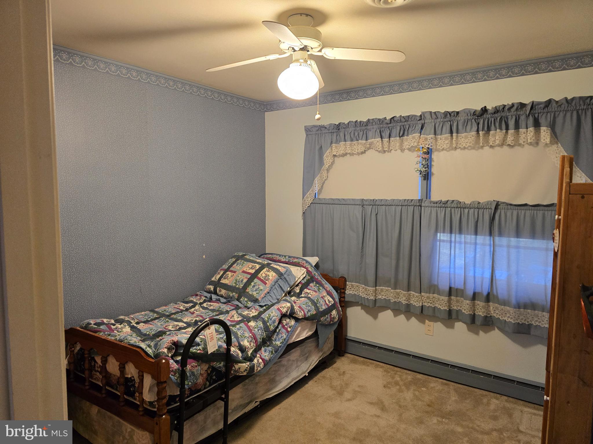 30332 Dagsboro Road Salisbury, MD 21804 - Photo 41 of 53 a bedroom with a bed and a window
