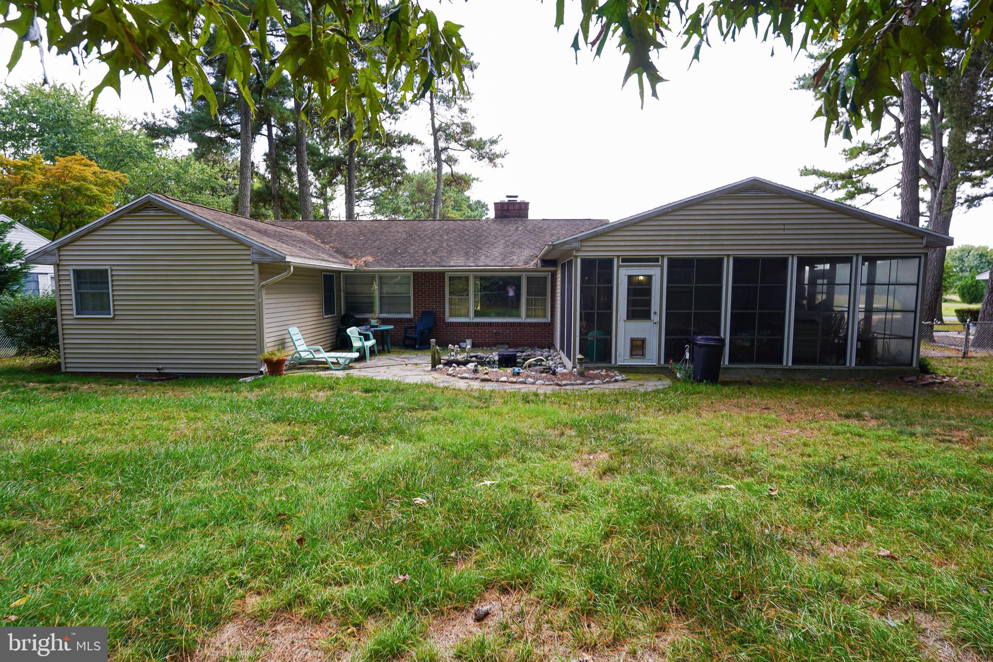 30332 Dagsboro Road Salisbury, MD 21804 - Photo 50 of 53 a front view of a house with a garden and porch