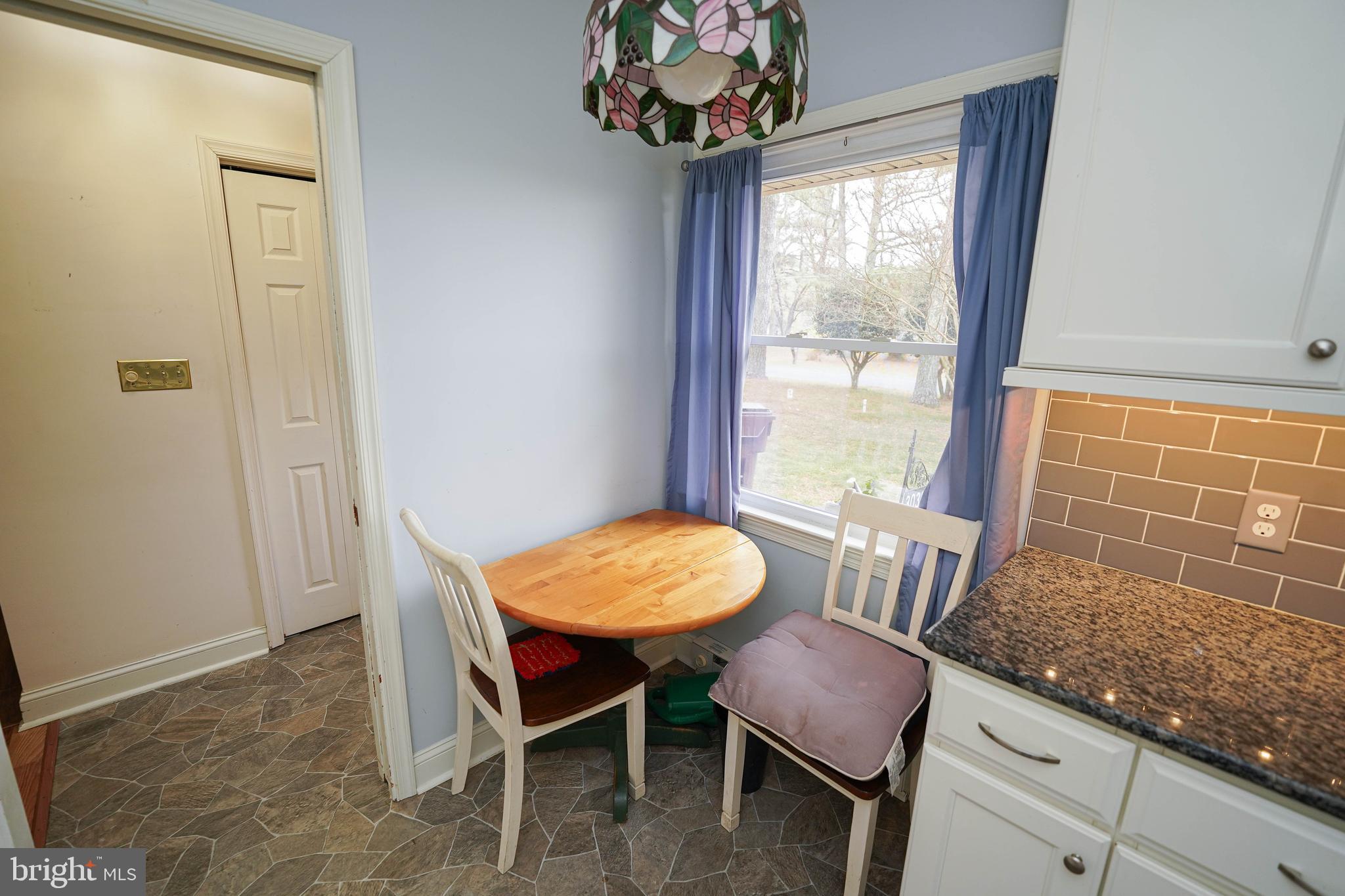 30332 Dagsboro Road Salisbury, MD 21804 - Photo 10 of 53 a view of a dining room with furniture window and outside view