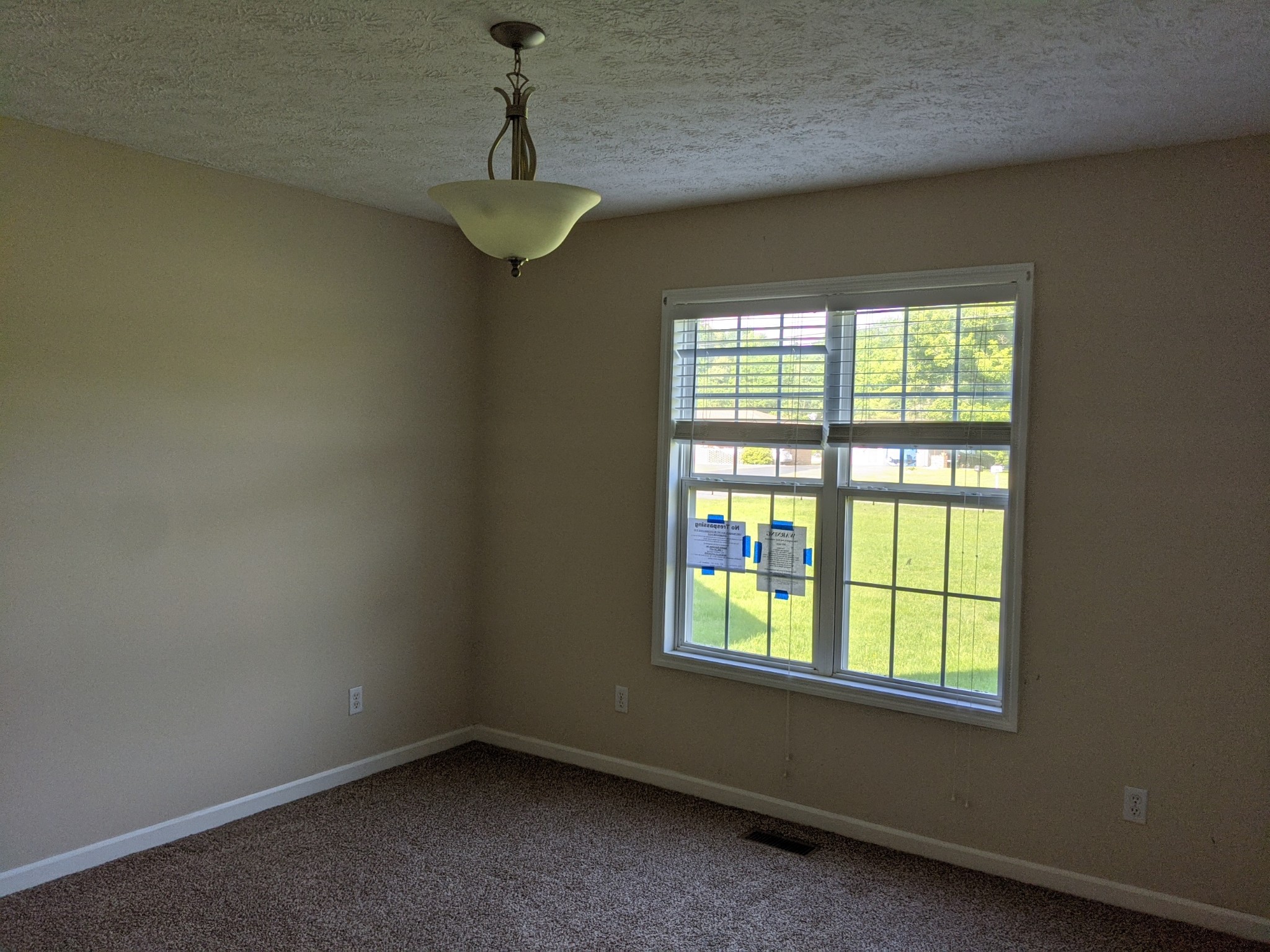 479 Rock Road Morrison, TN 37357 - Photo 8 of 16 an empty room with a window