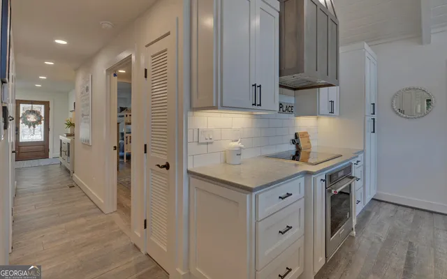 a bathroom with a glass shower door