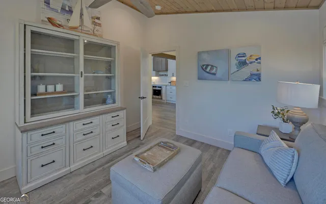 a view of a balcony with a table and chairs