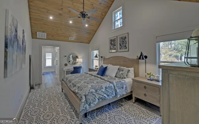 a bathroom with a granite countertop shower