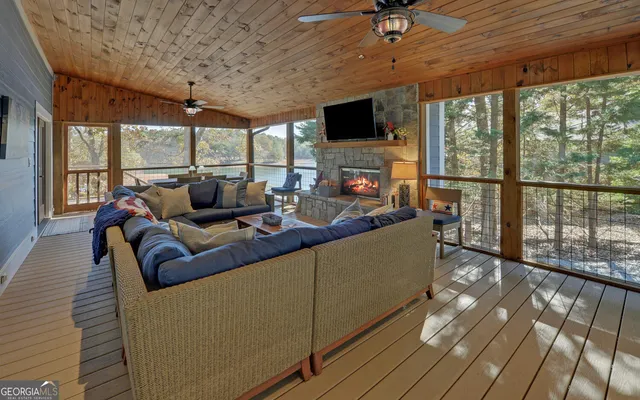a view of an empty room with a balcony