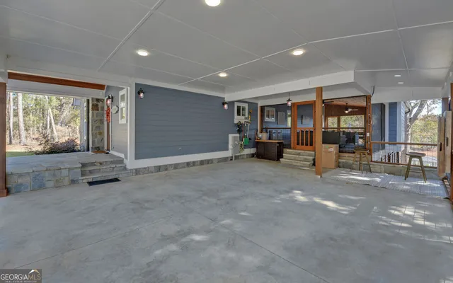 an aerial view of house with yard