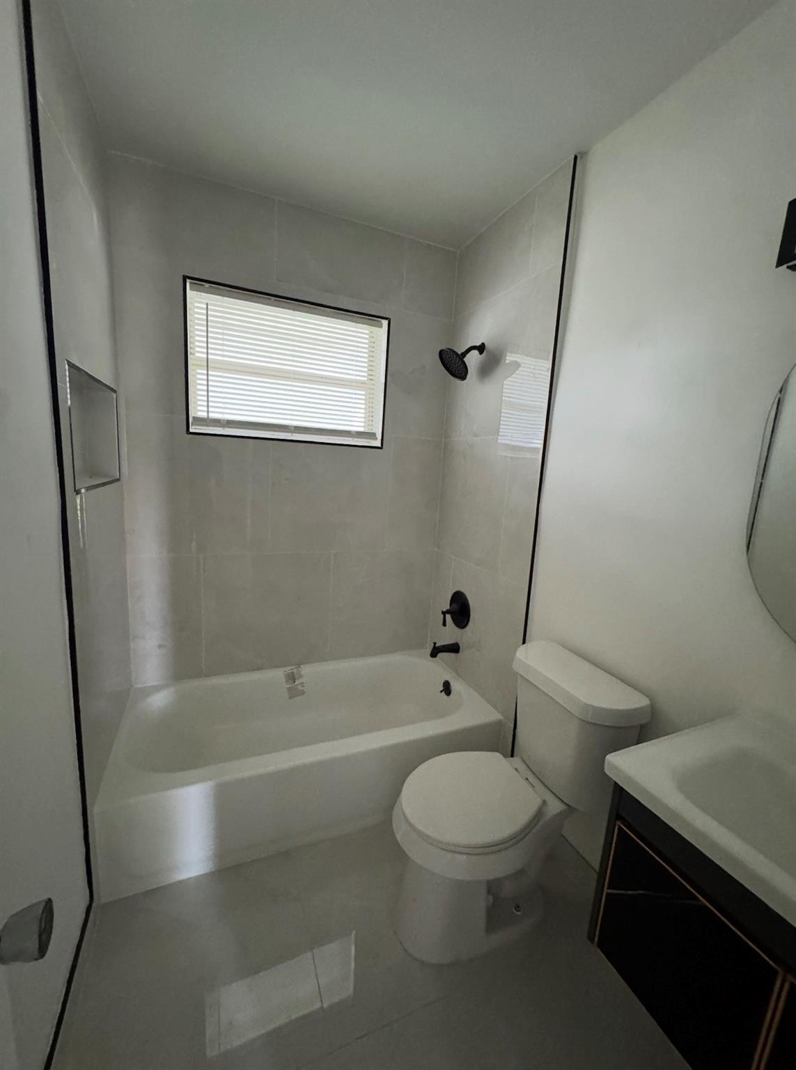 6201 Southwest 19th Street Miramar, FL 33023 - Photo 2 of 8 a bathroom with a toilet and a bath tub