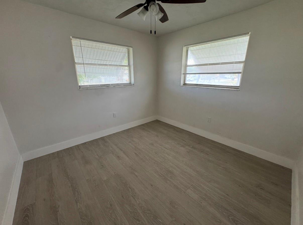 6201 Southwest 19th Street Miramar, FL 33023 - Photo 6 of 8 a view of an empty room with a window