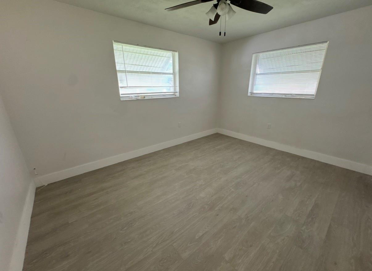 6201 Southwest 19th Street Miramar, FL 33023 - Photo 8 of 8 an empty room with a window
