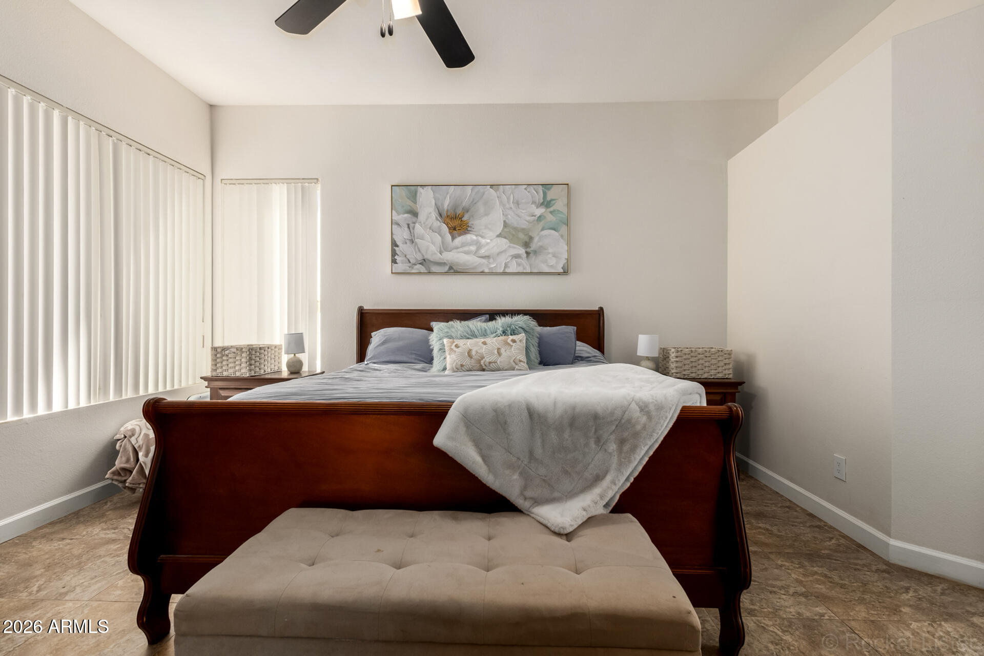 9545 East Inverness Circle Mesa, AZ 85209 - Photo 11 of 26 a bedroom with a bed and window