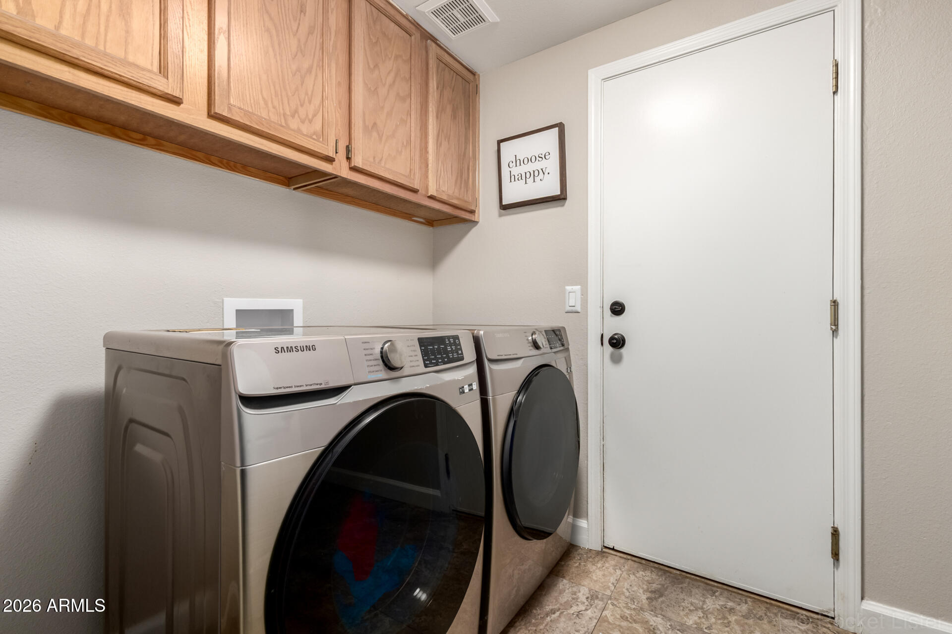 9545 East Inverness Circle Mesa, AZ 85209 - Photo 18 of 26 a utility room with dryer and washer