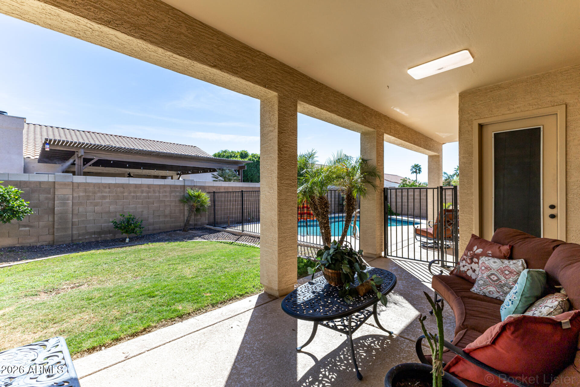 9545 East Inverness Circle Mesa, AZ 85209 - Photo 19 of 26 a view of an outdoor dining space with furniture