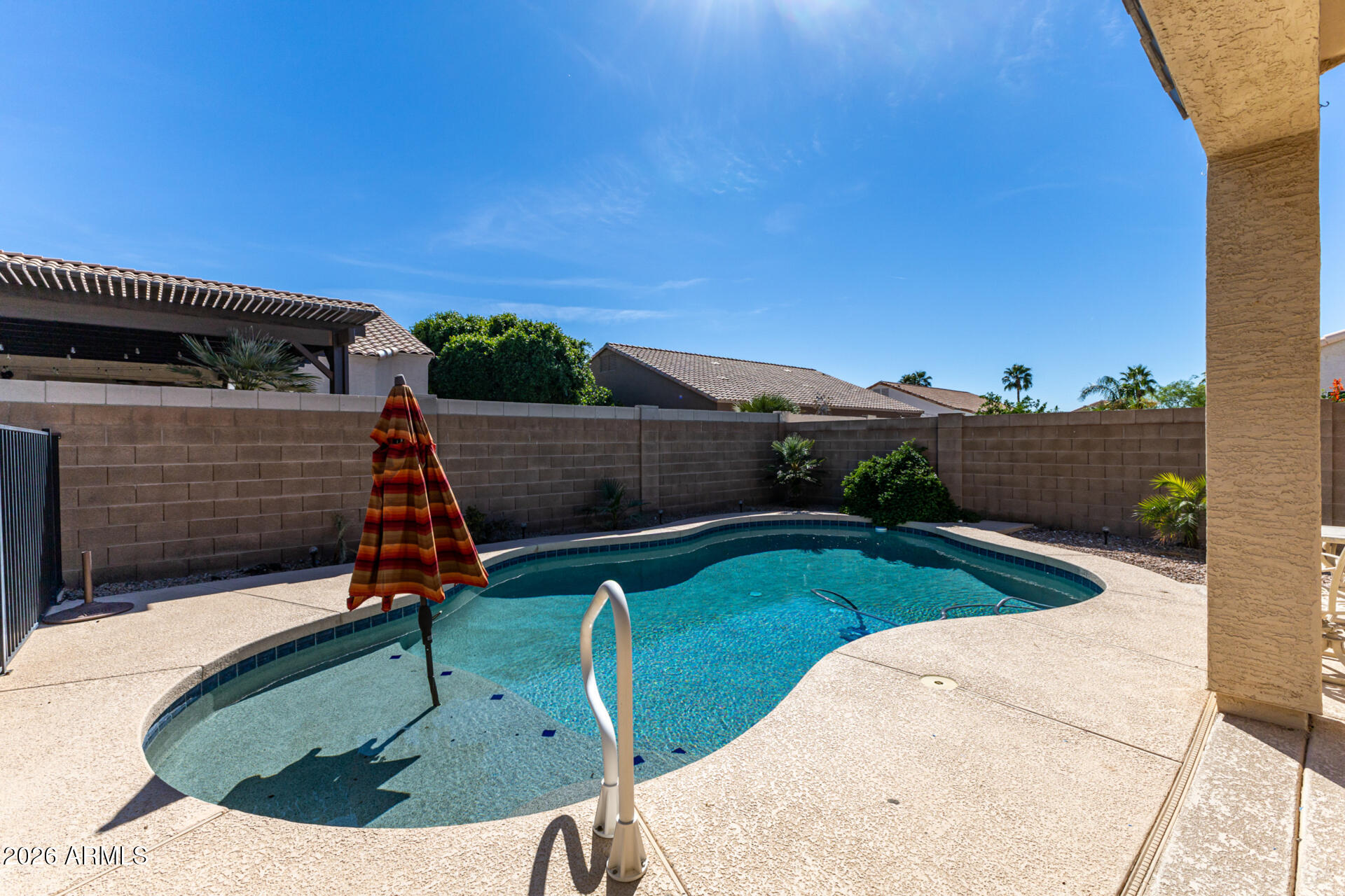 9545 East Inverness Circle Mesa, AZ 85209 - Photo 24 of 26 a view of a backyard with a slide