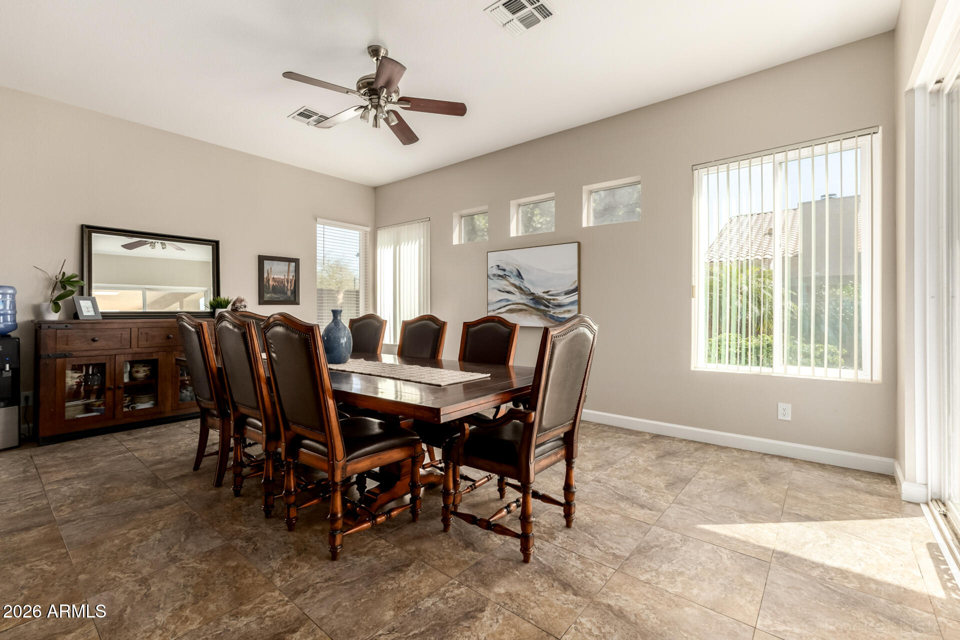 9545 East Inverness Circle Mesa, AZ 85209 - Photo 6 of 26 a view of a dining room with furniture
