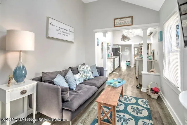 a living room with furniture and a table