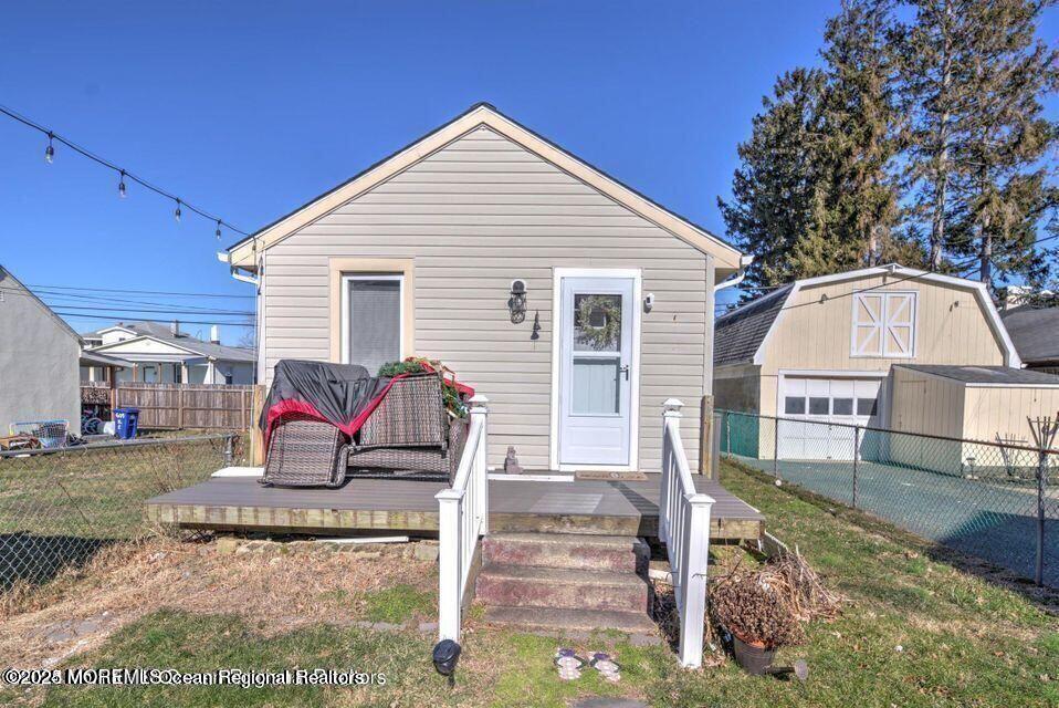 604 1/2 12th Avenue, Unit BACK HOUSE Belmar, NJ 07719 - Photo 19 of 19 a view of a house with a yard