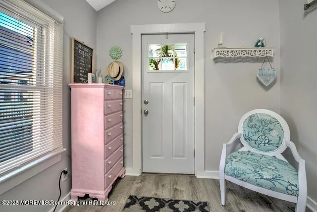 a view of front door with furniture