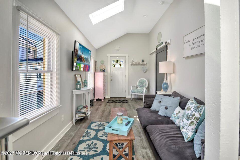 604 1/2 12th Avenue, Unit BACK HOUSE Belmar, NJ 07719 - Photo 5 of 19 a living room with furniture and a window
